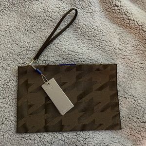 Rothy’s Dark Caramel Houndstooth wristlet